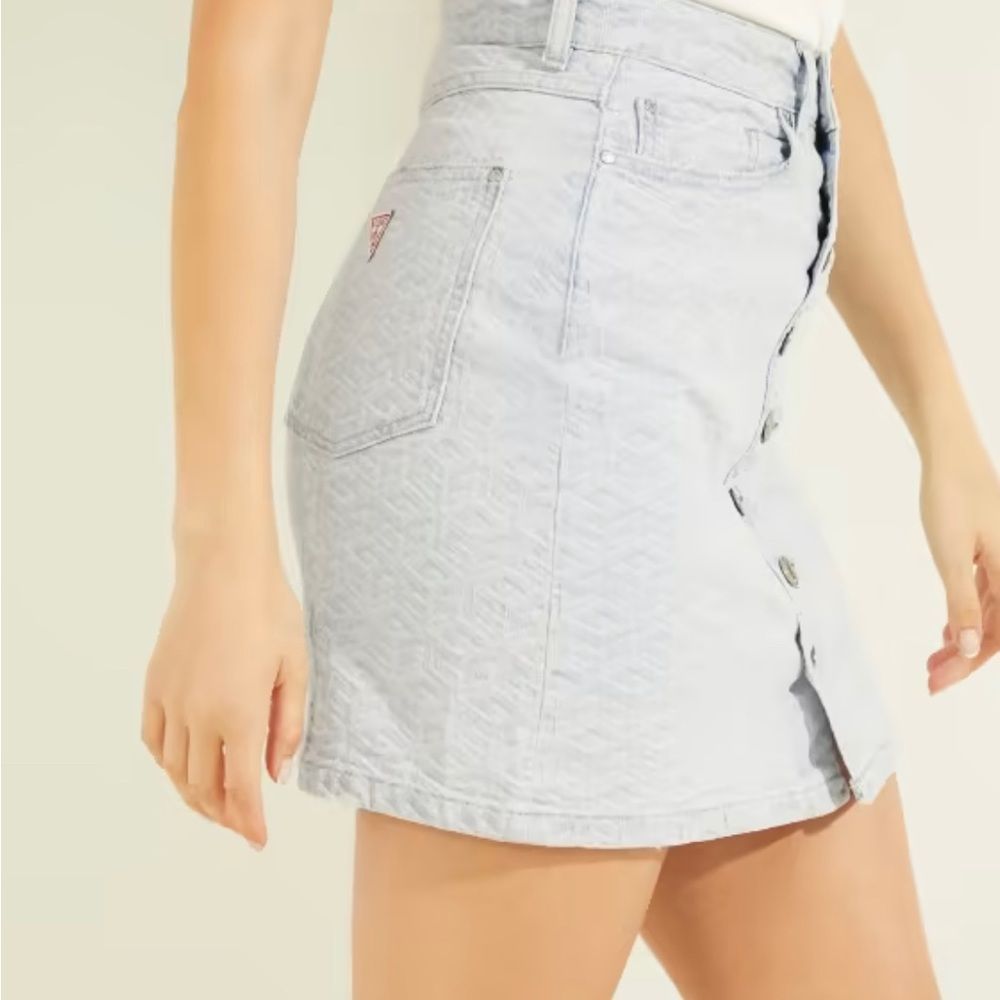 New w/ tags GUESS midi button down cube design jean skirt. Size 29. Great deal.